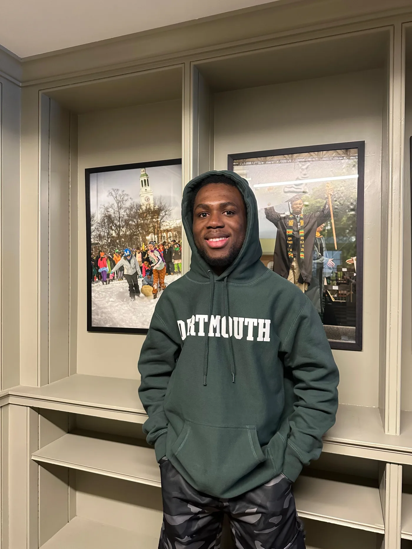 Emmanuel Prince Dey wearing a Dartmouth hoodie