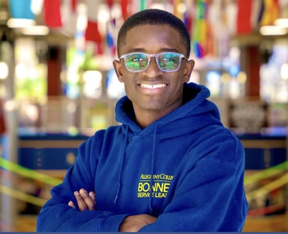 George Asante wearing an Allegheny College shirt