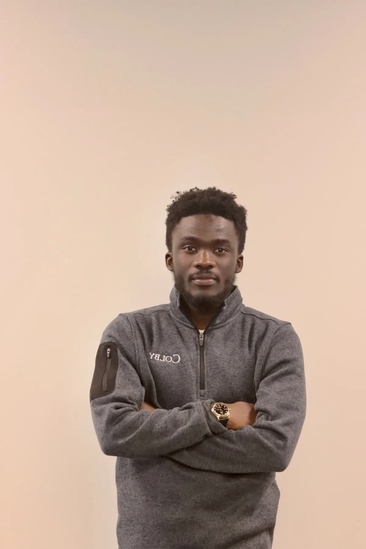 Ismaila Ahmed in a formal scholar portrait
