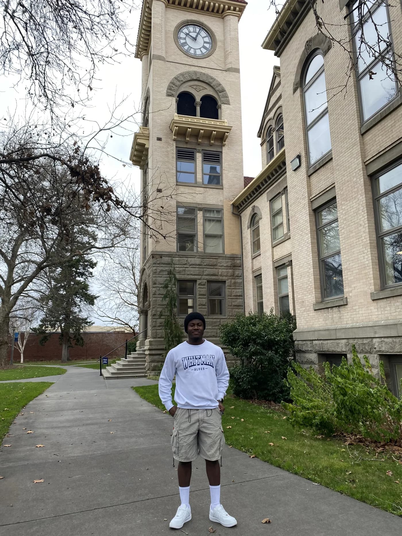 Stanley standing on the Whitman College campus
